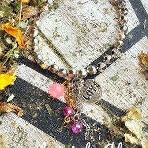 Beaded silver bracelet pink quartz and tassel charms